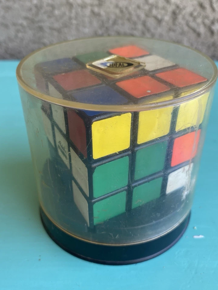 Brinquedo quebra-cabeça cubo Rubik’s vintage original dos anos 1980 na caixa com suporte - Imagem 3 de 4