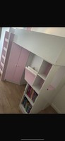 Cabin bed with desk, wardrobe and other storage.