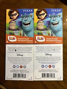 Dole/PIXAR pineapple tags, lot of 4. Used. With holes.