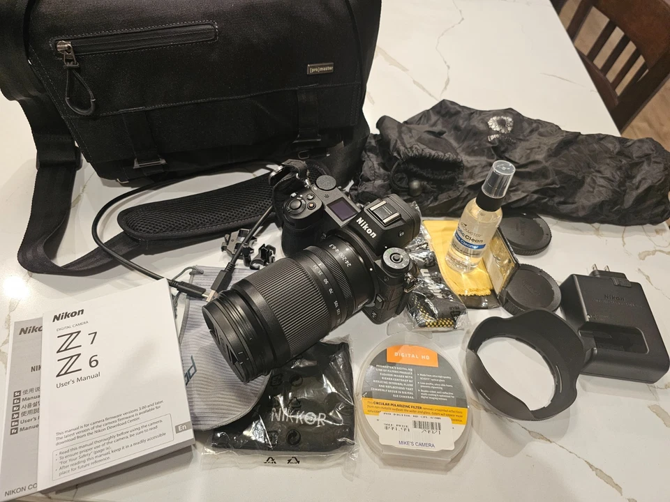 Nikon Z6 Mirrorless con accesorios!  ¡Apenas usado!  Pagado $3,500 Foto 2 de 4