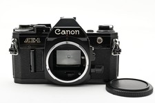  Mint   Canon AE-1 Black 35mm SLR Film Camera Body From JAPAN 1030