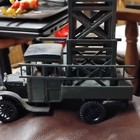 Green Diecast Military Truck with Tall Lattice Tower/Platform Model — photo 1