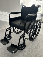 Black 4-Wheel Manual Wheelchair with Detachable Footrests