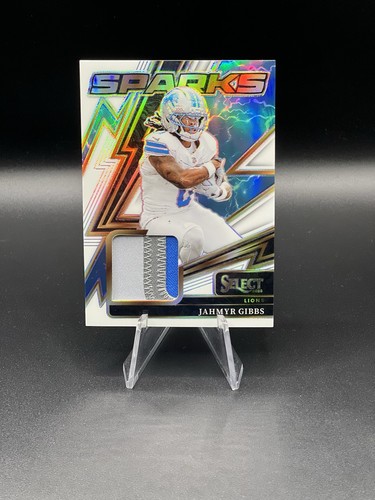 Jahmyr Gibbs Patch 2025 Panini Select Sparks White Prizm /99 Lions NFL #SPK-JGS