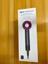 Imagen de Dyson Supersonic hair dryer in the classic pink/black everything included.