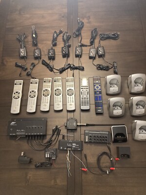 RTI -LOT of System Remotes, Docks, Processor, etc. As Pictured.