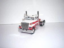 FIRST GEAR DCP 1/64 RED AND WHITE WITH RED STRIPE FORD LTL 9000 DAYCAB