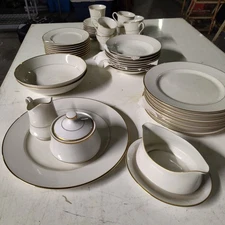 8-PIECE SET PLATES CUPS AND SAUCERS BOWLS PLUS SERVING BOWLS AND PLATTER 45 PCS.