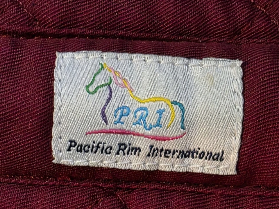 Almohadilla de montar de trail acolchada inglesa granate ligeramente usada con bolsillos, fondo polar Foto 3 de 4