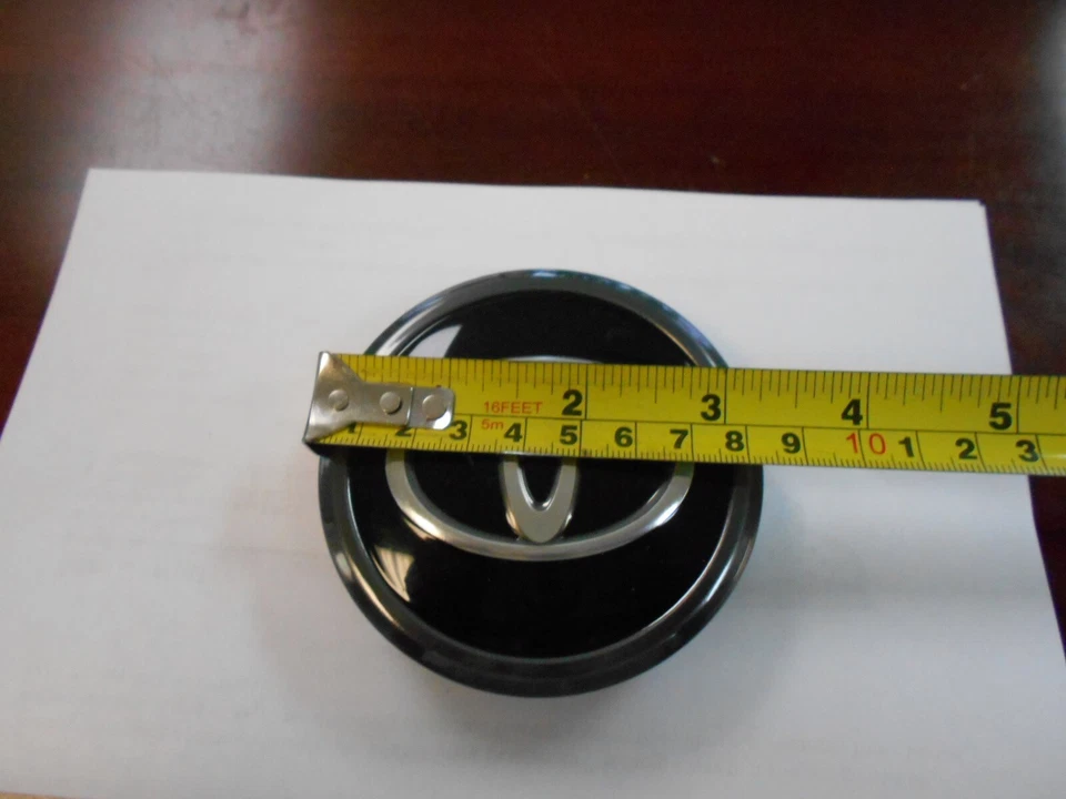 TOYOTA Tundra 2022-25, Tacoma 2024 tapa central individual 42603-AK010 *NUEVO* OEM Foto 3 de 4