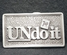 WK21145 VINTAGE 1977 **7UP UNDO IT** SODA POP FOUNTAIN DRINK PEWTER BELT BUCKLE