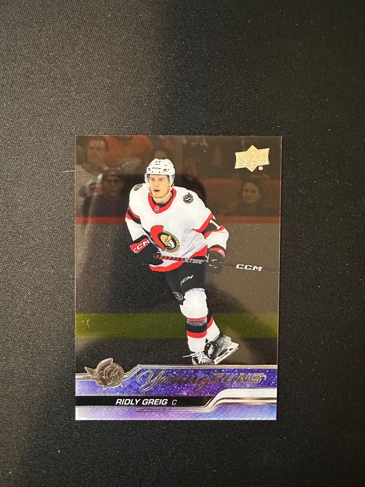 2023-24 Upper Deck Series 1 Ridly Greig Young Guns Clear Cut Rookie Card #212 YG