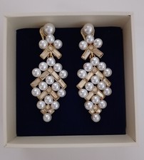 Oscar de la Renta - Ohrclips aus vergoldetem Metall.