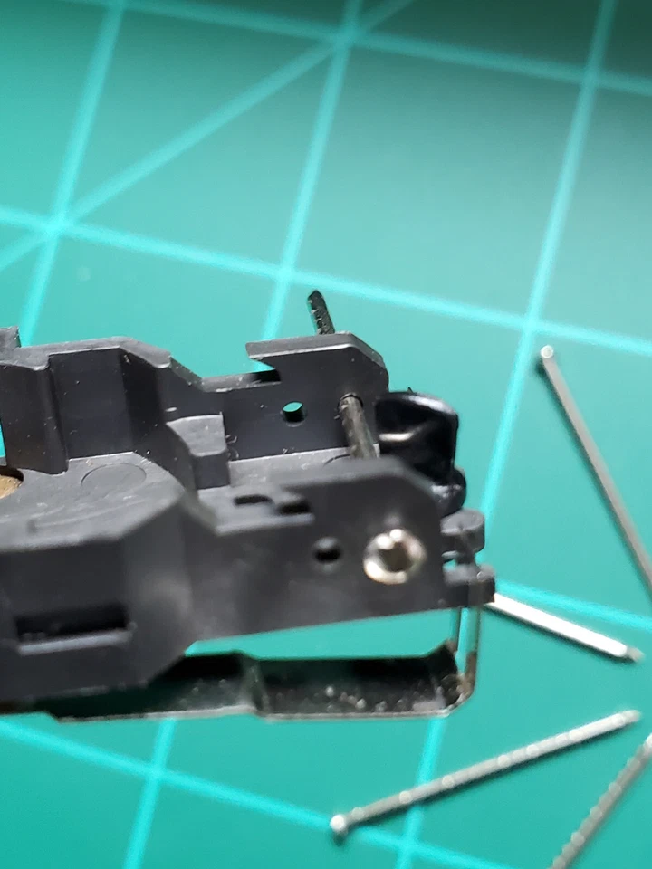 4x Solid Rivets, 2x 0-80 Brass Hex Nuts, 1x AFX Front Axle Kit - Image 2 of 4