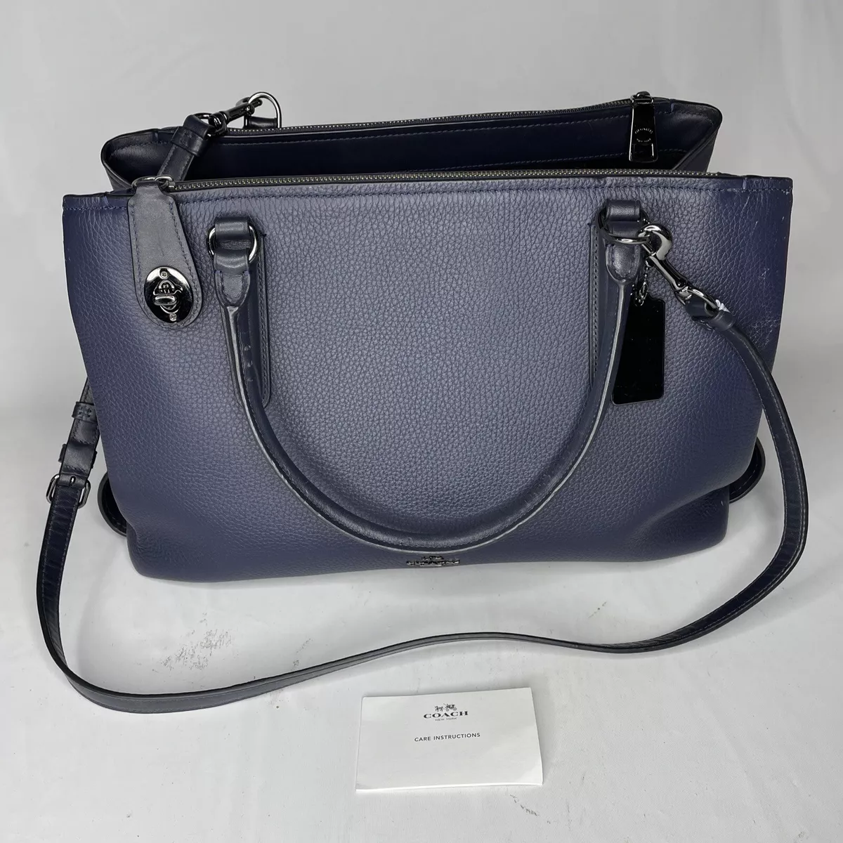 COACH Washed Denim Signature Swinger Bag in Blue | Lyst