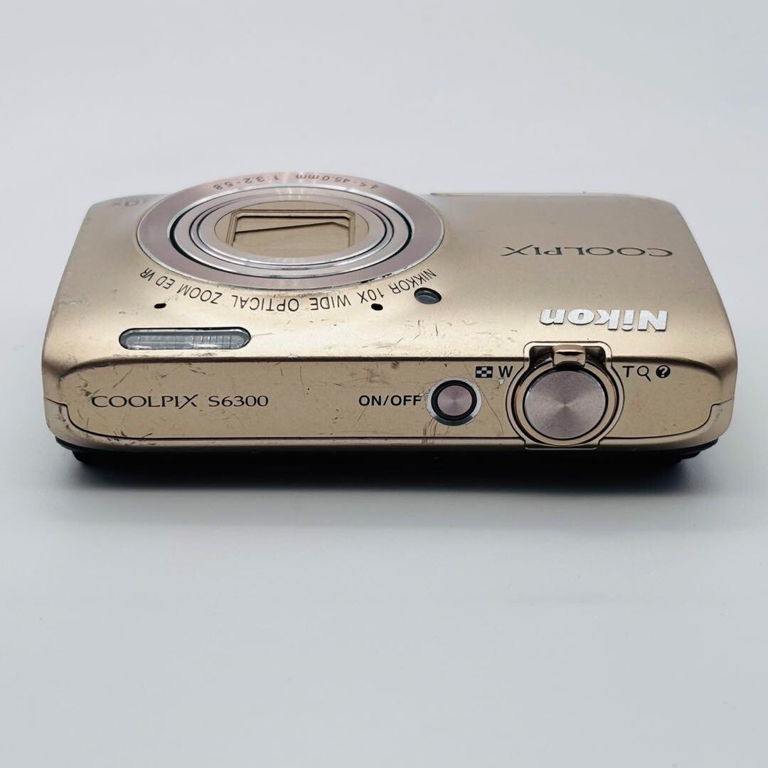 Nikon COOLPIX S6300 Gold Digital Camera 16.0 MP 10x Optical Nikon COOLPIX S6300 Gold Digital Camera 16.0 MP 10x Optical