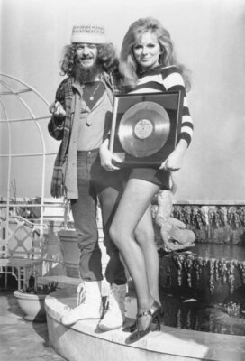 Ian Anderson of Jethro Tull and Model Julie Ege Photo Print Poster
