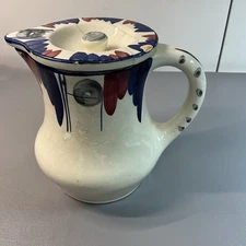 HEDWIG BOLLHAGEN CERAMIC PITCHER. MID 20 CENTURY. 6 IN. FLORAL PATTERN, (S876).