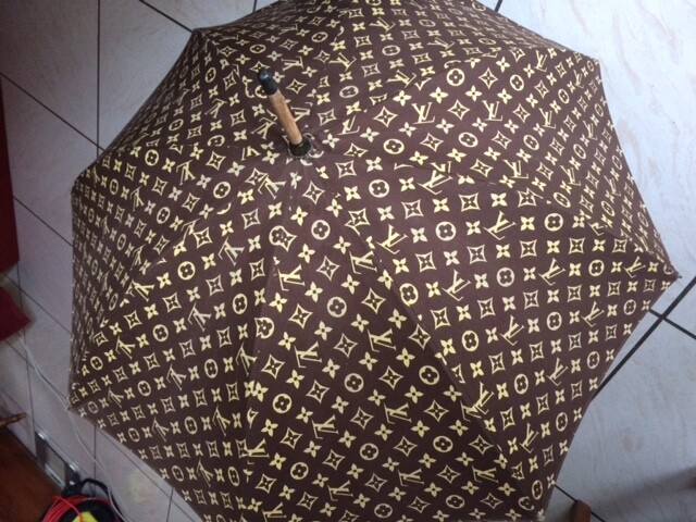 Louis Vuitton 1960s Decorative Monogram Umbrella · INTO