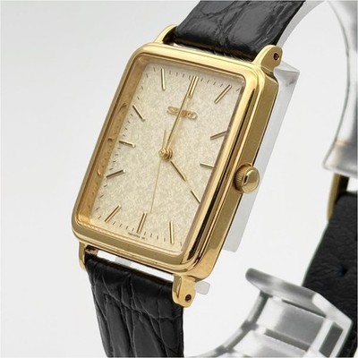 SEIKO 7N01-0FB0 Quartz Analog Gold Tone Black Strap in Hand Square