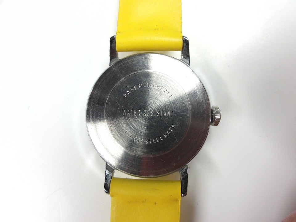 VINTAGE 1976 TIMEX YELLOW "SNOOPY" TENNIS WATCH MYSTERY BALL SECOND