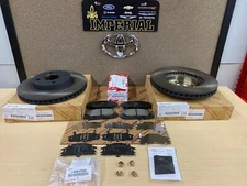 2012-2019 TOYOTA PRIUS C GENUINE OEM FRONT BRAKE ROTORS TCMC PADS AND OEM SHIMS 