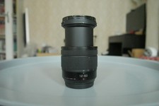 Panasonic Lumix G Vario 12-60mm f3.5-5.6 Power O.I.S. MFT Objektiv + 2 Filter