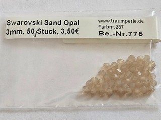 50 Swarovski Doppelkegel 3 mm Sand Opal der Fa. Traumperle