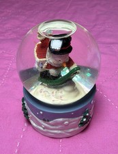 Miniature Winter Snow Globe With A Snowman Snowboarding In Glitter