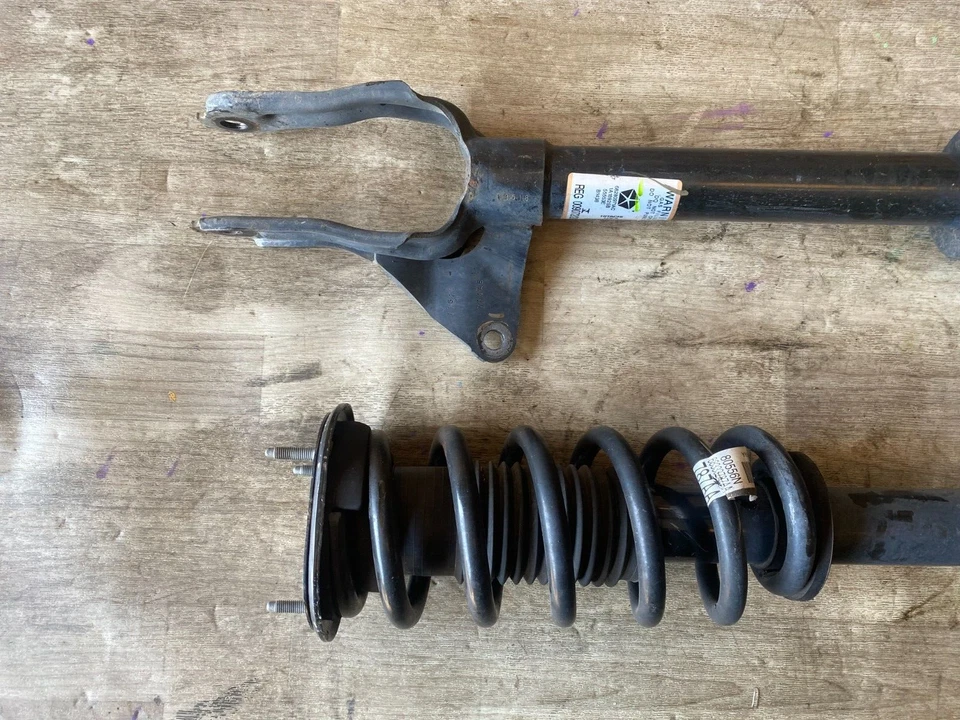 JUEGO AMORTIGUADOR DELANTERO IZQUIERDO Y DERECHO DODGE DURANGO GRAND CHEROKEE OEM AWD Foto 2 de 4