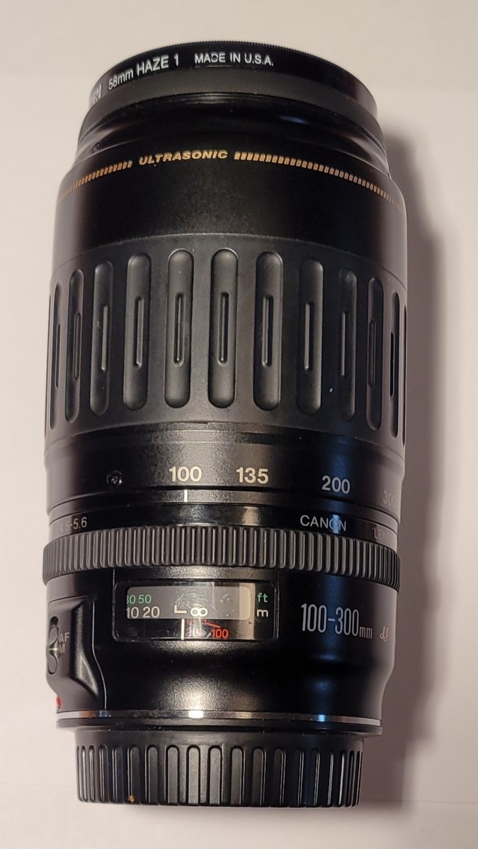 Canon EF 100-300mm f/4.5-5.6 USM Zoom Lens + Cap + Haze Filter +