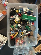 Mixed Assortment of Toys. Boxes Of Legos Imaginext And Other Miscellaneous