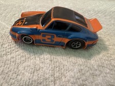 Aurora AFX Porsche 911 3 Orange/blue/black. W/working Chassis.