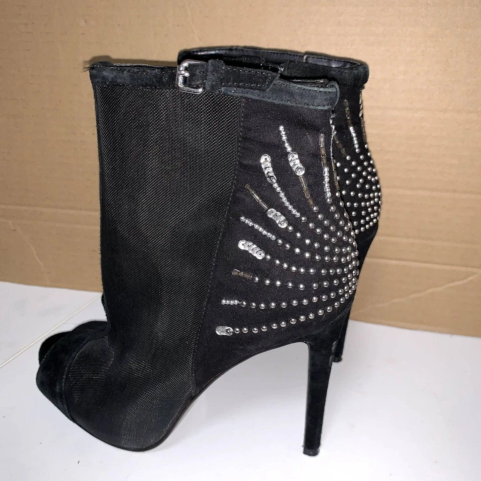 Botas Guess para mujer Polli de tela negra punta abierta al tobillo, estilo malla 71/2 M. Foto 2 de 4