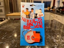 NEW IN PACKAGE 1990 New Kids On The Block Key Chain Viewer 24 Frames Orange
