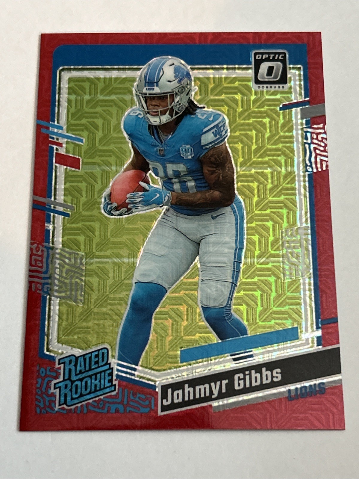 2023 Panini Donruss Optic - Rated Rookie Jahmyr Gibbs #236 Red Mojo Prizm (RC)