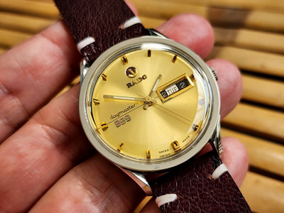 RADO DAYMASTER 999 AUTOMATIC DATE SWISS MADE STAINLESS STEEL VINTAGE GOLD DIAL.
