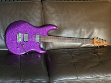 Ernie Ball Music Man Luke 3 HH in Fuschia Sparkle (Steve Lukather sig. Luke iii)