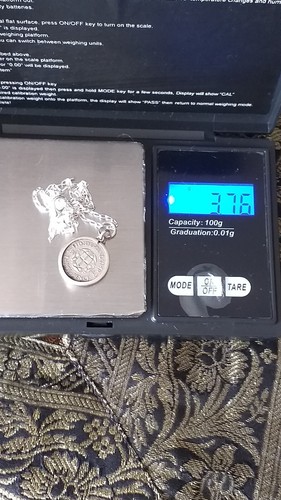 Antiguo colgante de moneda vintage de plata del rey Jorge VI de 1940 en caden... - Imagen 8 de 9