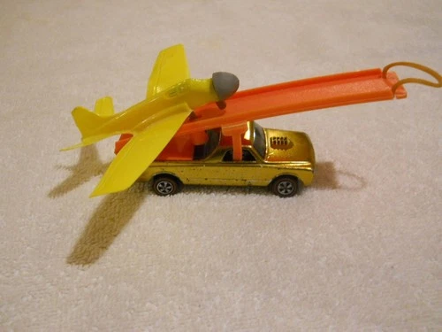 Hot Wheels Redline Skyshow Fleetside (Rare Gold Color) with Plane. nice example