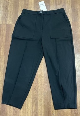 Zara carrot fit trousers front patch pockets bold seams tapered leg modern style
