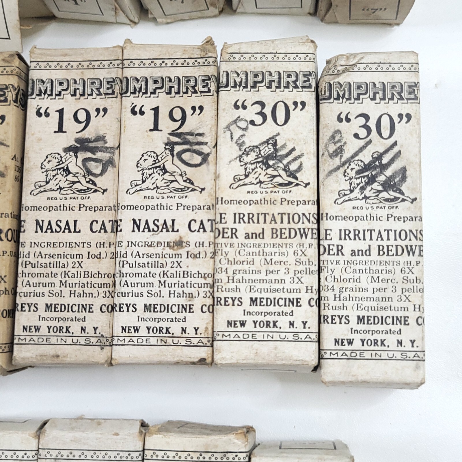 Lot (20) c.1895 Humphreys Medicine Co. Homeopathic Cure Bottles & Boxes