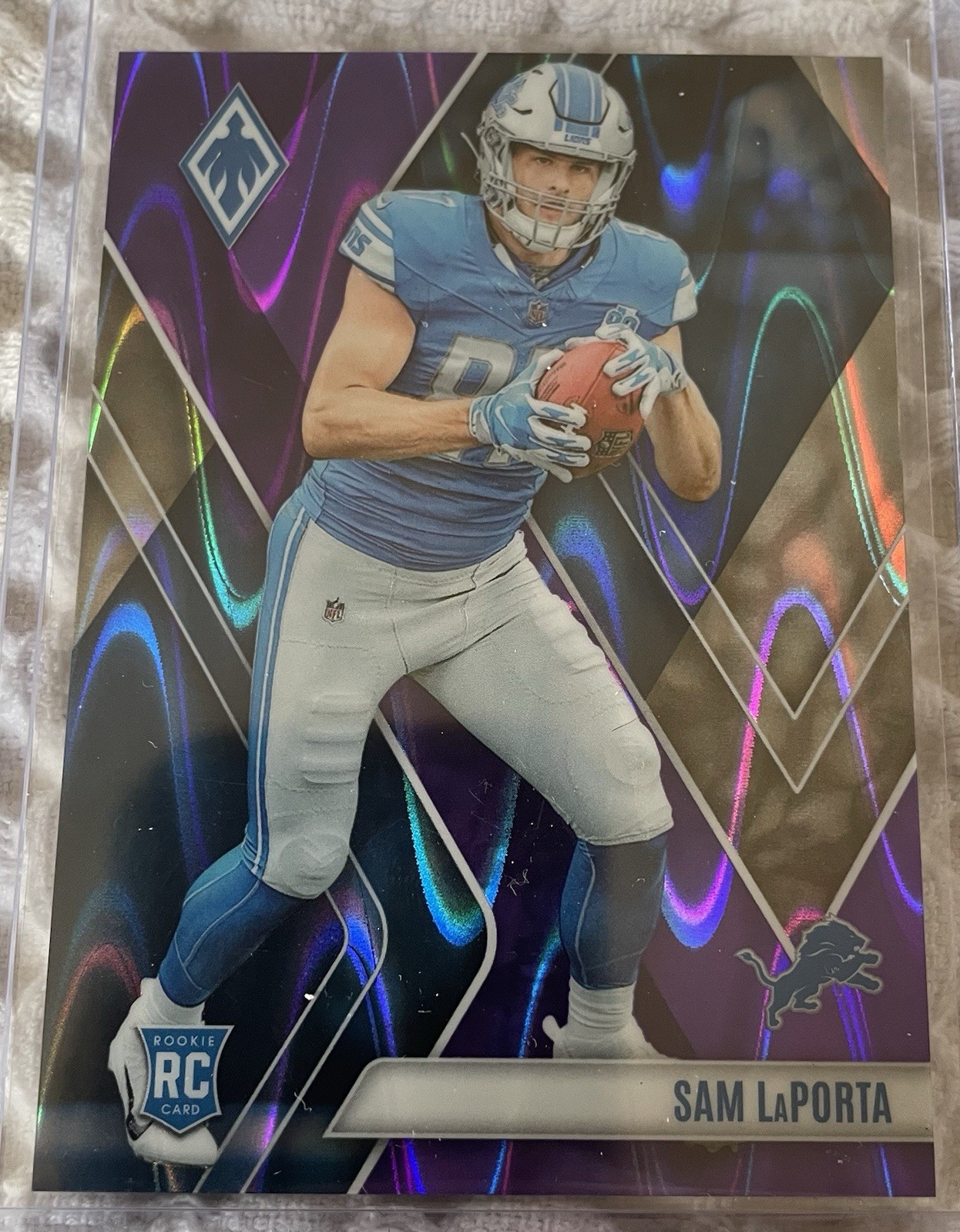 2023 Panini Phoenix Sam LaPorta Rookie Purple Parallel #115/125 Detroit Lions