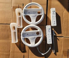 Nintendo Wii Wheels And 2 Controllers