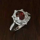 2.50 Ct Oval Cut Lab-Created Garnet Halo Engagement Ring 14K White Gold Plated