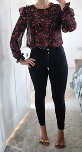 ladies black frilly blouse