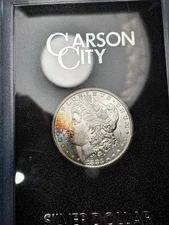 1883-CC GSA Hoard Morgan Dollar Box & Papers Rainbow Toning Nice Grade