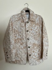 Chicos size 1 women  s size m tan white floral print quilted jacket