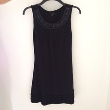 Dress Black Sleeveless Dress Size 12 Beaded Neck ruffled hem  stylish elegant