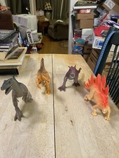 Boley Lot of 4 Plastic Dinosaur Toys Allosaurus Stegosaurus Carnotaurus Raptor